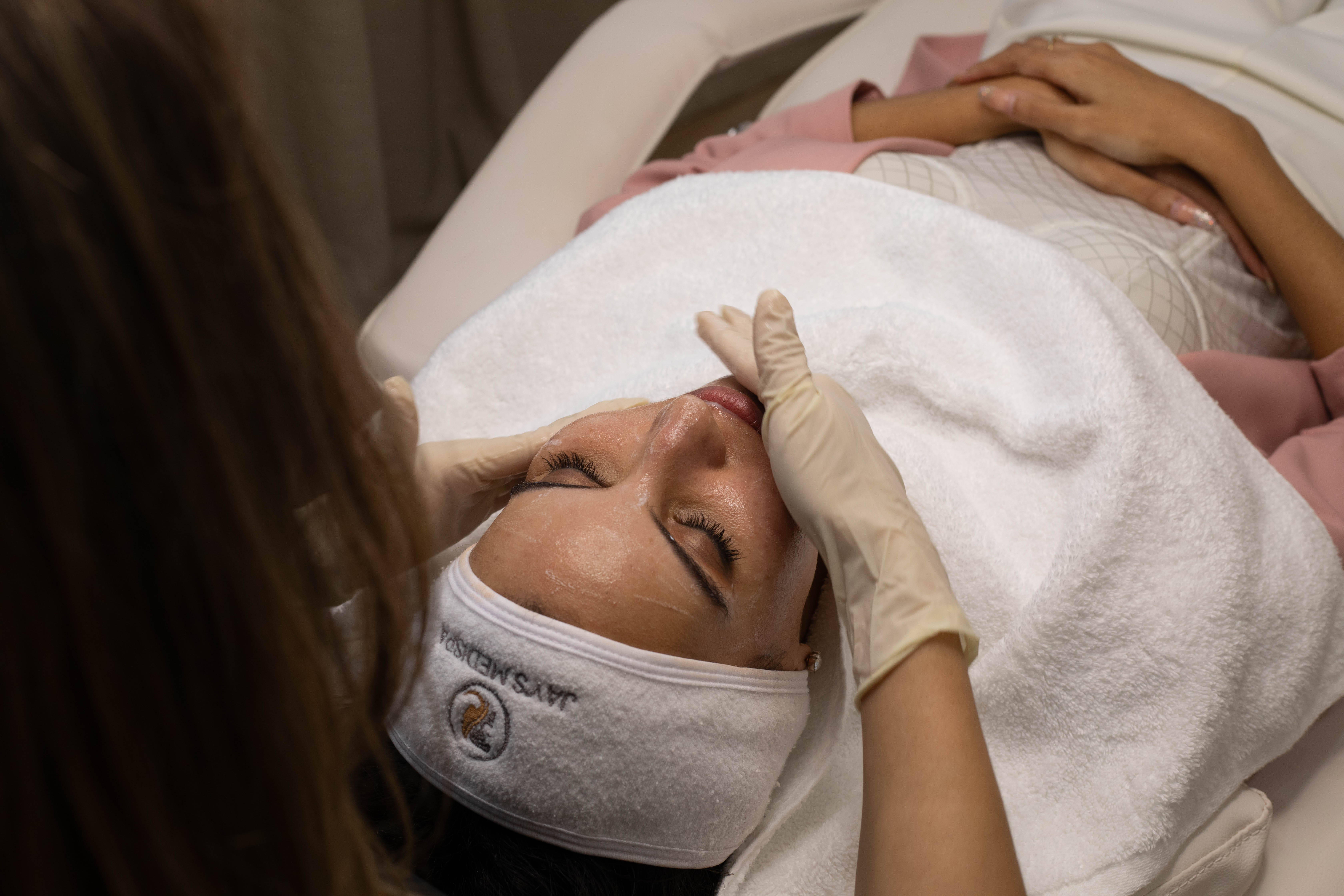 Client facial with Jay Ann